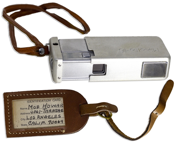 Moe Howard's Handwritten Luggage Tag & His Minolta-16 Miniature Camera, in Brown Leather Case -- Leather Tag Measures 3.75'' x 2'', Cased Camera Measures 4'' x 2'' -- Very Good